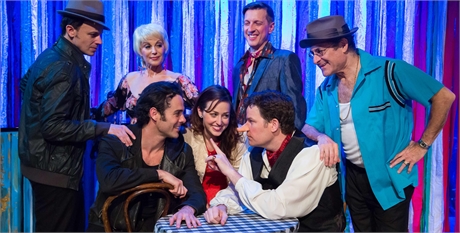 (Back Row) Craig McEldowney, Valerie Perri, Chad Borden and Barry Pearl; (At Table) Chad Doreck, Suzanne Petrela and Tim Martin Gleason star in the World Premiere of "SERRANO THE MUSICAL," choreography by Peggy Hickey, directed by Joel Zwick and now playing at the Matrix Theatre in West Hollywood.
